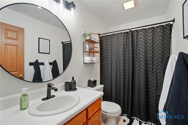 28178 Schriber St, Walbridge, OH 43465 - bathroom with toilet, vanity, and a shower with shower curtain