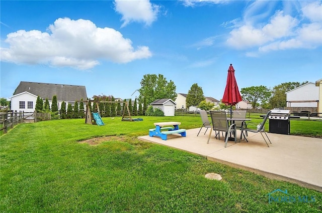 28178 Schriber St, Walbridge, OH 43465 - view of yard with a patio area and a playground