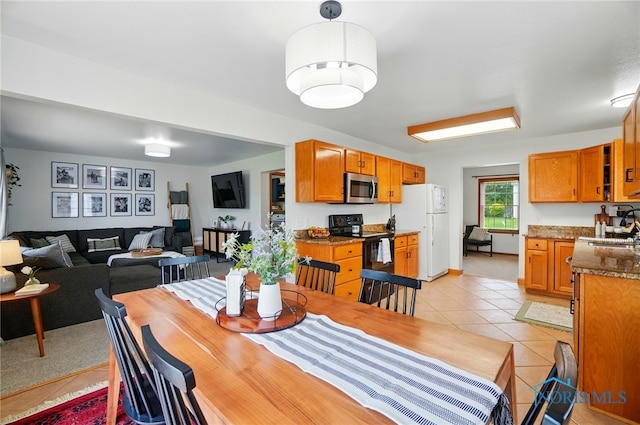 28178 Schriber St, Walbridge, OH 43465 - dining area with light tile patterned flooring