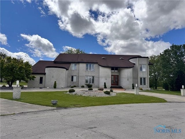 322 Dublin Ln, Bryan, OH 43506 - view of front of house featuring a front lawn and french doors