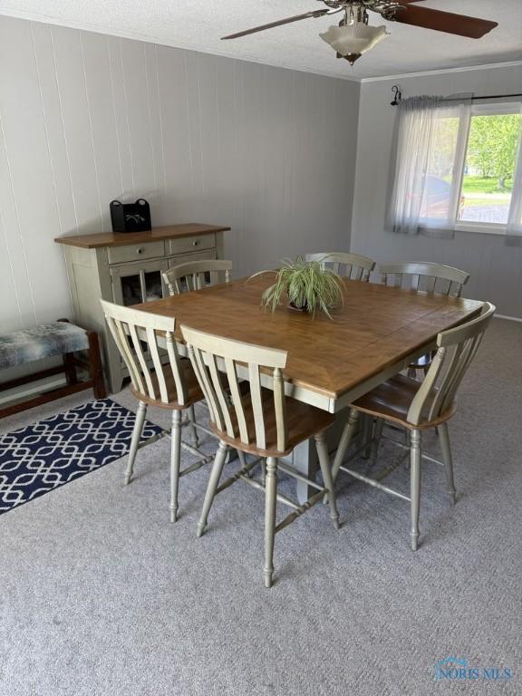 1133 Inverness Dr, Findlay, OH 45840 - dining room with a ceiling fan and carpet floors