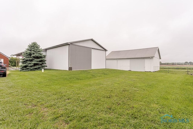 16470 County Road P, Napoleon, OH 43545 - view of pole building with a lawn