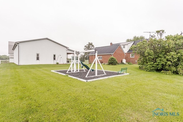 16470 County Road P, Napoleon, OH 43545 - view of grassy yard with a playground
