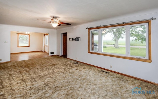 16470 County Road P, Napoleon, OH 43545 - carpeted spare room with baseboards and a ceiling fan