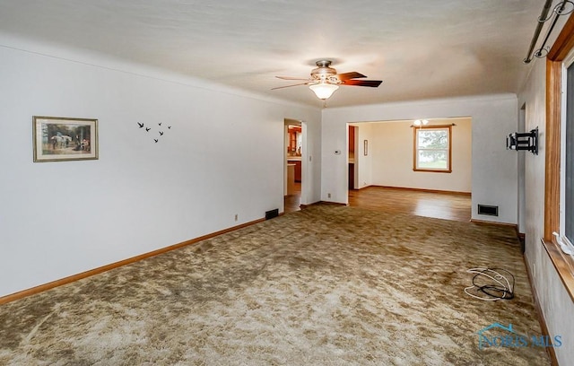 16470 County Road P, Napoleon, OH 43545 - carpeted spare room with a ceiling fan and baseboards