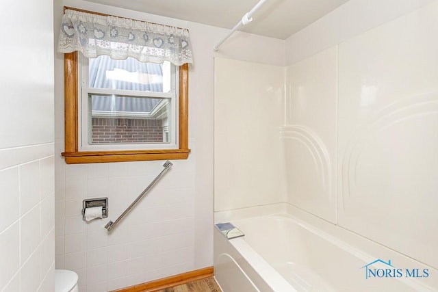 16470 County Road P, Napoleon, OH 43545 - bathroom featuring bathtub / shower combination and toilet
