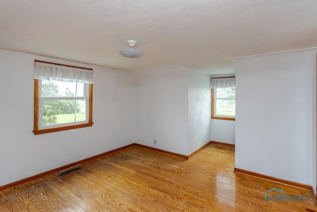 16470 County Road P, Napoleon, OH 43545 - empty room featuring light wood-style flooring and baseboards