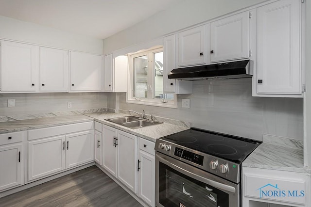 1385 Berdan Ave, Toledo, OH 43612 - kitchen with stainless steel electric range oven, under cabinet range hood, a sink, and white cabinets