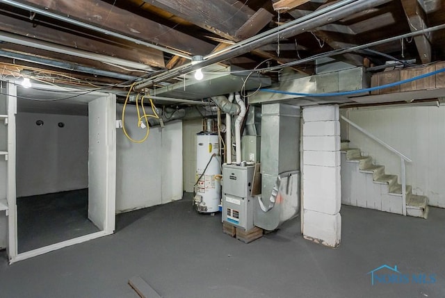 1385 Berdan Ave, Toledo, OH 43612 - unfinished below grade area with gas water heater, heating unit, and stairway