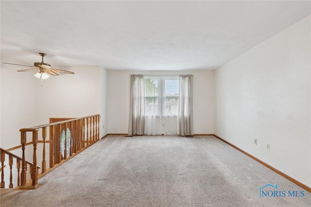 146 Partridge Ln, Perrysburg, OH 43551 - carpeted spare room with baseboards and ceiling fan