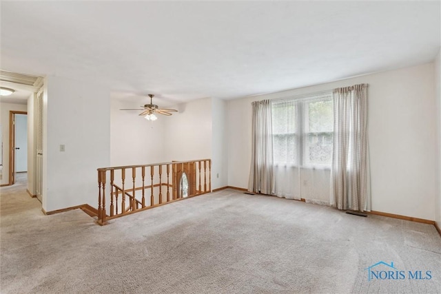 146 Partridge Ln, Perrysburg, OH 43551 - unfurnished room featuring carpet floors, baseboards, and ceiling fan