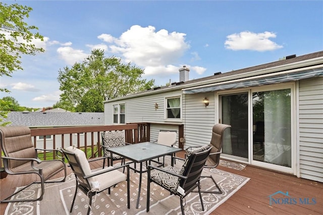 146 Partridge Ln, Perrysburg, OH 43551 - wooden deck with outdoor dining space