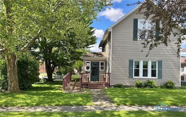 108 E Maple St, Deshler, OH 43516 - view of front of home featuring a front lawn
