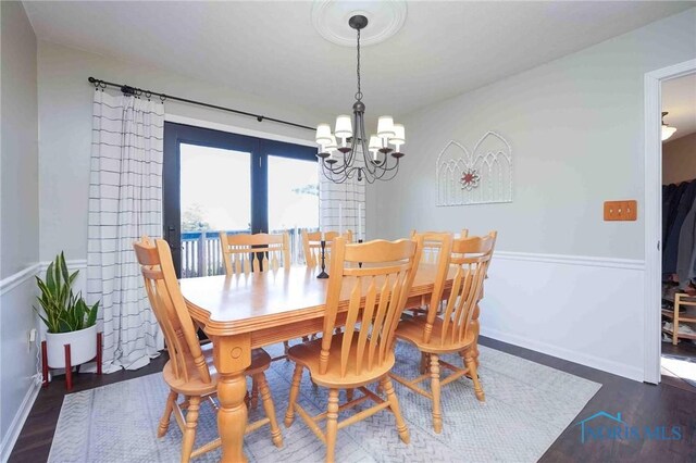 16070 Rd S, Columbus Grove, OH 45830 - dining room featuring a chandelier and wood finished floors