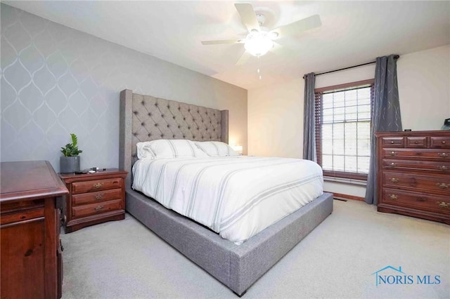 16070 Rd S, Columbus Grove, OH 45830 - bedroom featuring light colored carpet and ceiling fan