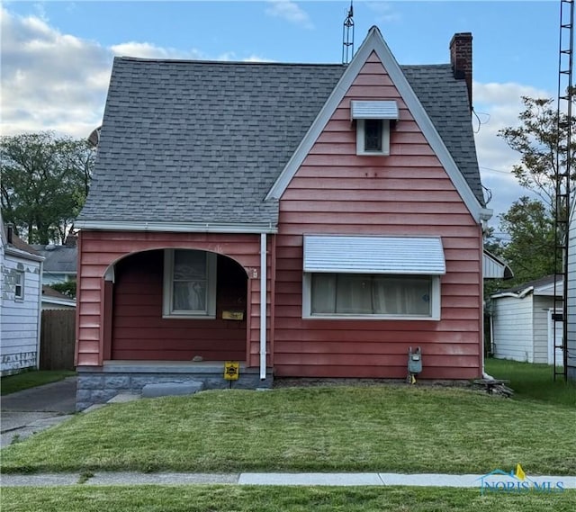 1726 Balkan Pl, Toledo, OH 43613 - view of front of property featuring a chimney and roof with shingles
