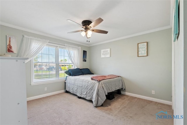 1250 Indiana Ave, Napoleon, OH 43545 - bedroom featuring crown molding, carpet floors, baseboards, and a ceiling fan