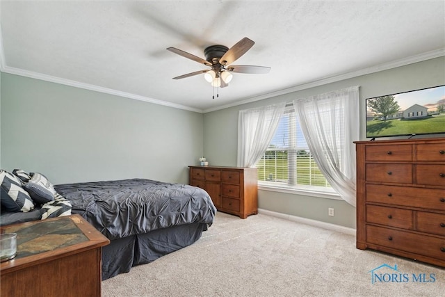 1250 Indiana Ave, Napoleon, OH 43545 - carpeted bedroom with baseboards, crown molding, and a ceiling fan
