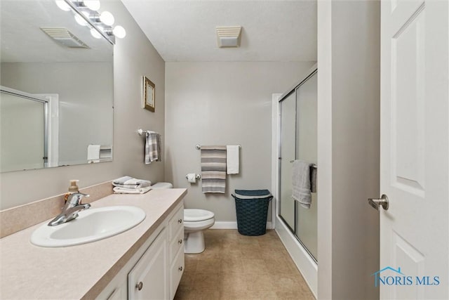 1250 Indiana Ave, Napoleon, OH 43545 - bathroom with a shower stall, vanity, toilet, and baseboards