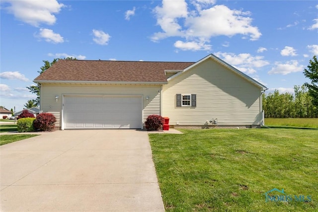 1250 Indiana Ave, Napoleon, OH 43545 - view of front of house featuring concrete driveway, a garage, and a front lawn