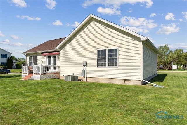 1250 Indiana Ave, Napoleon, OH 43545 - back of house featuring cooling unit, a yard, crawl space, and a deck