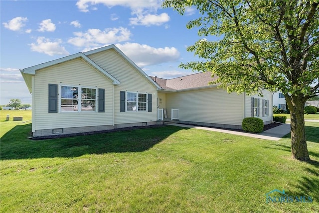 1250 Indiana Ave, Napoleon, OH 43545 - view of front of home featuring a front yard and roof with shingles