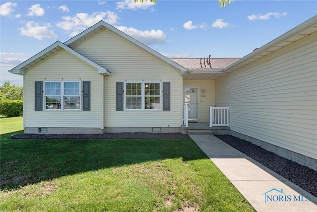 1250 Indiana Ave, Napoleon, OH 43545 - view of front of property featuring a front lawn and a shingled roof
