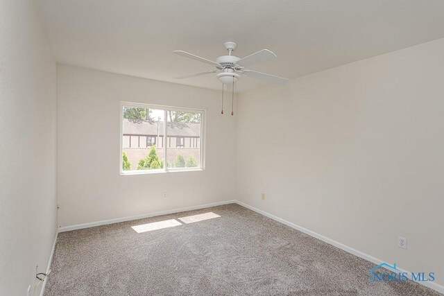 4022 Stonehenge Dr Unit 4022, Sylvania, OH 43560 - carpeted spare room featuring a ceiling fan and baseboards