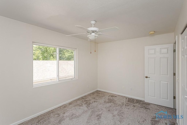 4022 Stonehenge Dr Unit 4022, Sylvania, OH 43560 - unfurnished room with ceiling fan, carpet floors, and baseboards