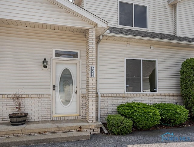 4022 Stonehenge Dr Unit 4022, Sylvania, OH 43560 - doorway to property featuring brick siding
