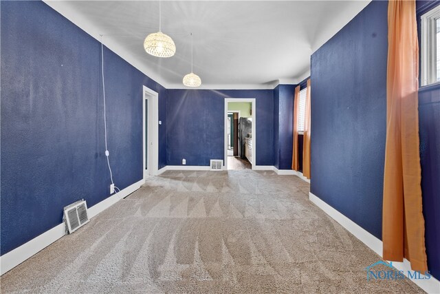 1006 Woodward Ave, Toledo, OH 43608 - empty room with carpet floors and baseboards