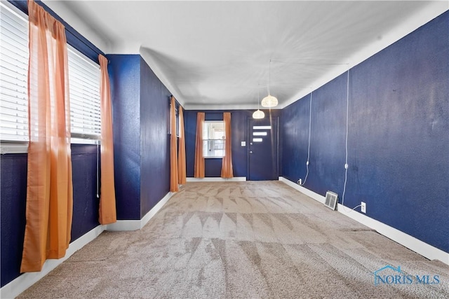 1006 Woodward Ave, Toledo, OH 43608 - unfurnished room featuring carpet and baseboards
