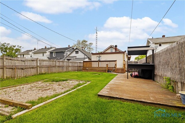 1006 Woodward Ave, Toledo, OH 43608 - view of yard with a wooden deck