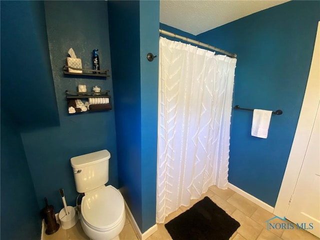5806 Elmer Dr, Toledo, OH 43615 - full bathroom with toilet, baseboards, and curtained shower