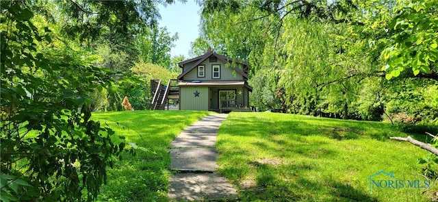 5806 Elmer Dr, Toledo, OH 43615 - view of front of home with stairway and a front lawn