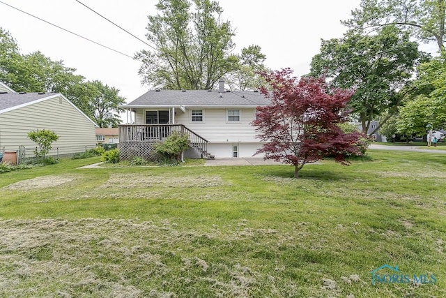 1201 Birch Ave, Maumee, OH 43537 - rear view of property with a lawn and a wooden deck
