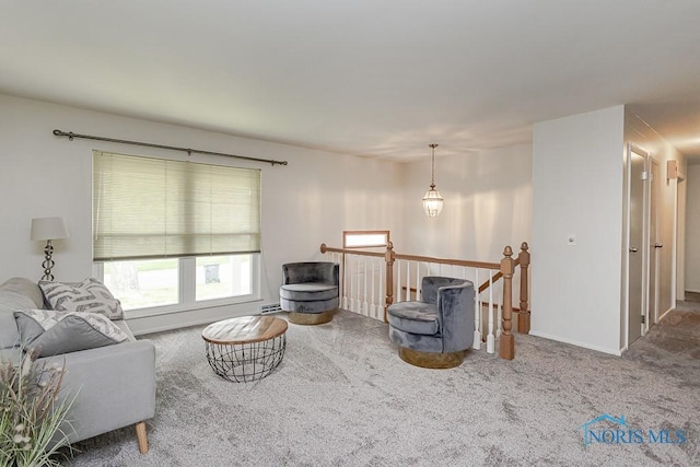 1201 Birch Ave, Maumee, OH 43537 - living area featuring an upstairs landing and carpet flooring
