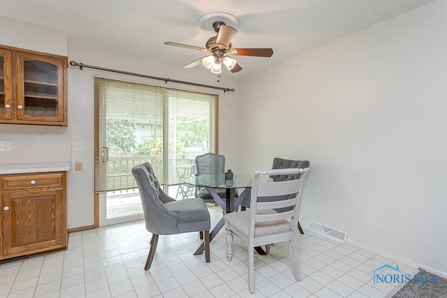 1201 Birch Ave, Maumee, OH 43537 - dining space featuring a ceiling fan and baseboards