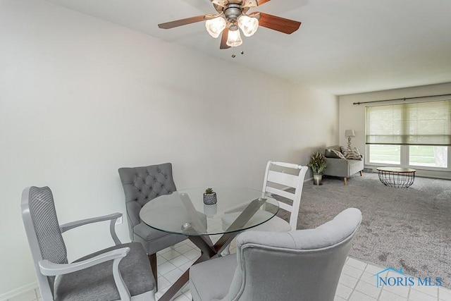 1201 Birch Ave, Maumee, OH 43537 - dining room with a ceiling fan, carpet flooring, and baseboards