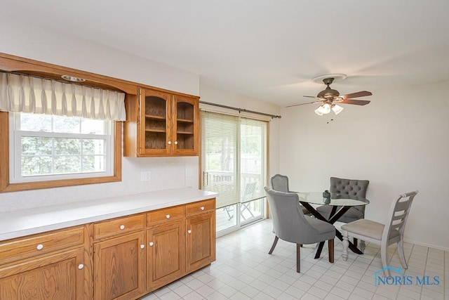 1201 Birch Ave, Maumee, OH 43537 - dining area featuring ceiling fan, light tile patterned floors, and baseboards