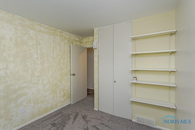 1201 Birch Ave, Maumee, OH 43537 - unfurnished bedroom featuring carpet flooring, a closet, and baseboards