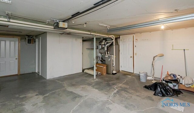 1201 Birch Ave, Maumee, OH 43537 - garage featuring heating unit and a garage door opener