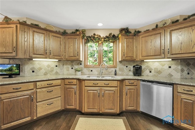 350 Osage Ct, Perrysburg, OH 43551 - kitchen with stainless steel dishwasher, a sink, dark wood-type flooring, light stone counters, and backsplash