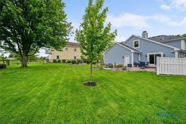 26741 Green Ville Dr, Perrysburg, OH 43551 - view of yard with a patio