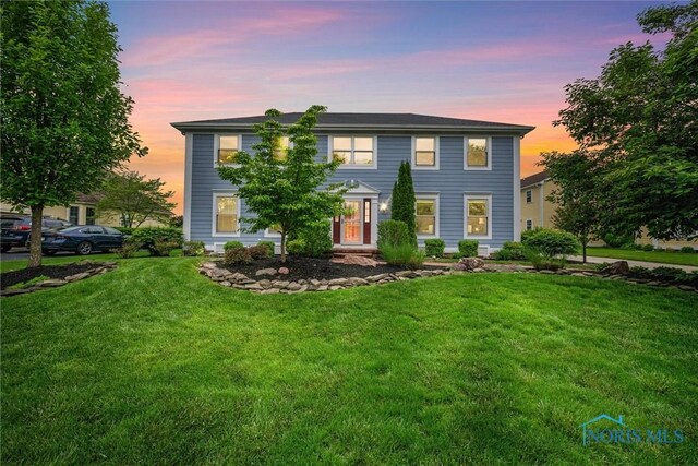 26741 Green Ville Dr, Perrysburg, OH 43551 - colonial house with a lawn