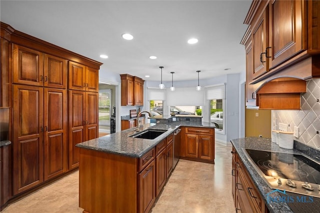 26741 Green Ville Dr, Perrysburg, OH 43551 - kitchen with a sink, black electric cooktop, decorative backsplash, recessed lighting, and healthy amount of natural light