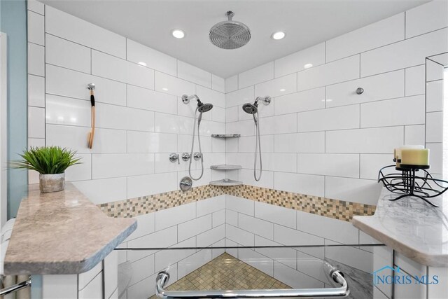 26741 Green Ville Dr, Perrysburg, OH 43551 - bathroom featuring tiled shower and recessed lighting