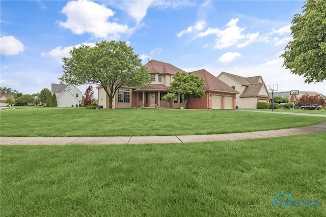 4729 Talon Trl, Maumee, OH 43537 - view of front facade featuring a garage, a front yard, and driveway