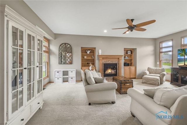 4729 Talon Trl, Maumee, OH 43537 - living room featuring carpet, a ceiling fan, a high end fireplace, baseboards, and recessed lighting