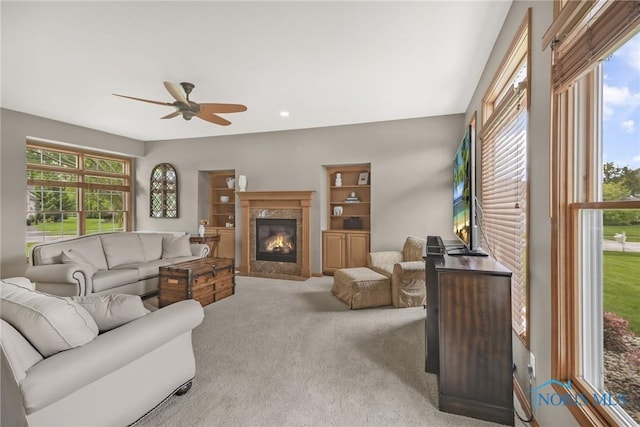 4729 Talon Trl, Maumee, OH 43537 - carpeted living room with ceiling fan, a premium fireplace, and recessed lighting